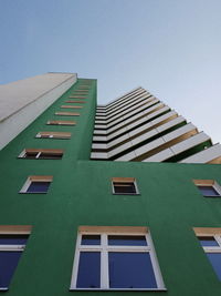 Low angle view of modern building against clear sky