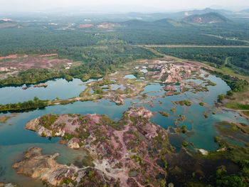 High angle view of lake and mountain against sky