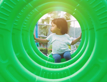 Boy playing in playground