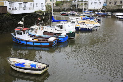 High angle view of boats moored at harbor