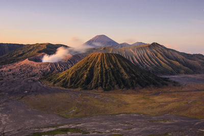 Scenic view of volcanic landscape during sunset