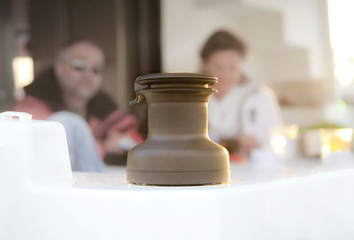 Close-up of beer glasses on table at restaurant