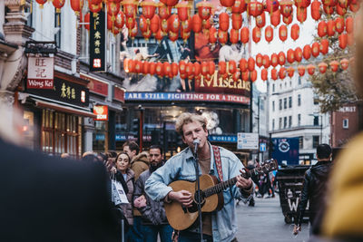 Group of people in front of building