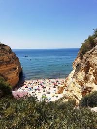 Scenic view of sea against clear blue sky