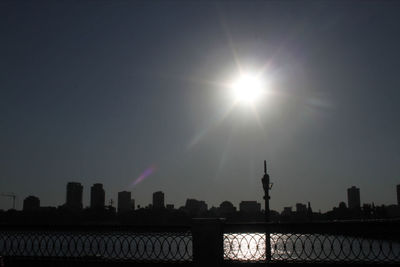 Cityscape by nile river during sunny day