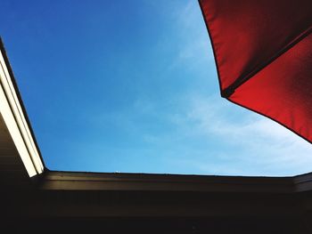 Low angle view of built structure against blue sky