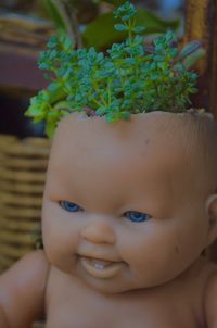 Close-up portrait of cute baby doll 