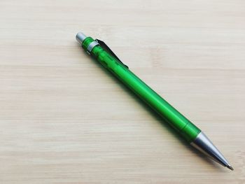 Close-up of green table