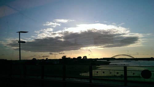 Scenic view of cloudy sky at sunset