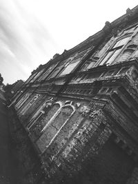 Low angle view of old building against sky