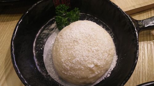 High angle view of meat in cooking pan