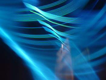 Close-up of light trails against black background