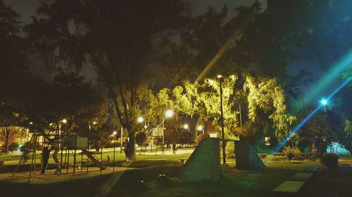 Illuminated street light at night