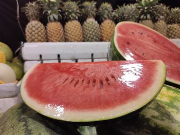 Close-up of fruit slices in plate on table