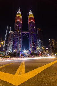 Illuminated city lit up at night