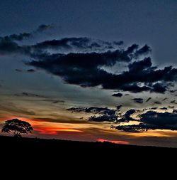 Scenic view of silhouette landscape against sky during sunset