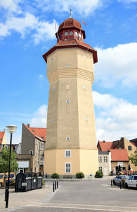 View of building against cloudy sky