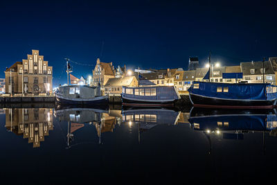 Reflection of illuminated city at night