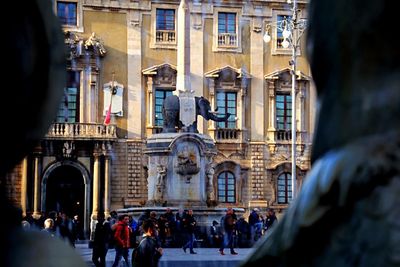 People in front of building