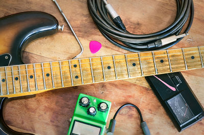 Close-up of guitar on table