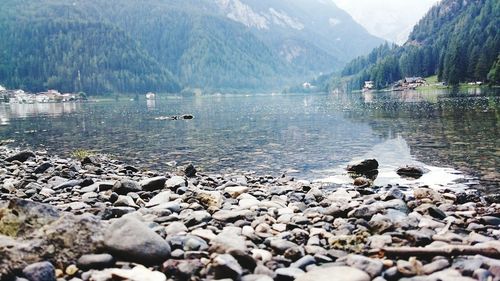 Scenic view of lake with mountains in background