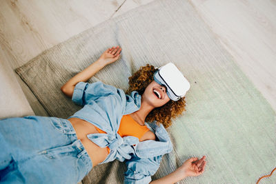 High angle view of woman using mobile phone