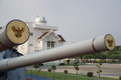 Low angle view of telephone pole against sky