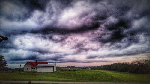 Landscape against cloudy sky