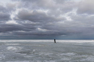 Scenic view of sea against sky during winter