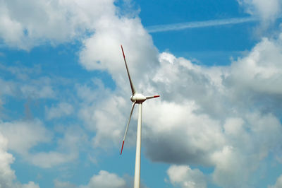 Low angle view of wind turbine against sky