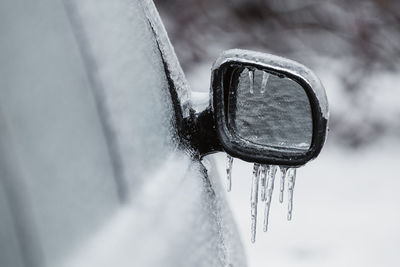 Close-up of bicycle wheel during winter