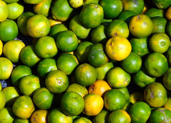 Full frame shot of oranges in market