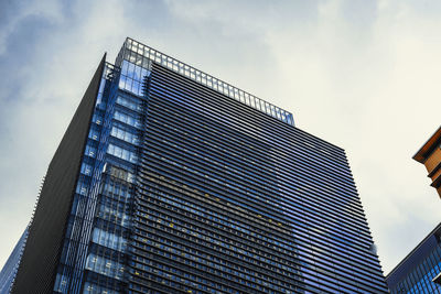 Low angle view of modern building against sky