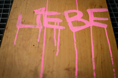 Close-up of pink text