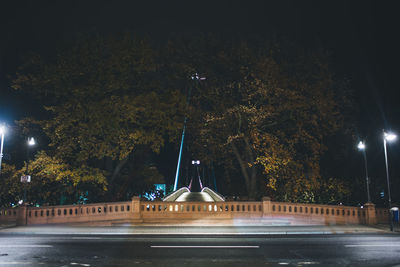 Illuminated street light at night