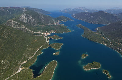 High angle view of sea and mountains