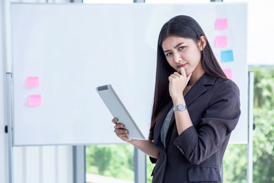 Young woman using mobile phone