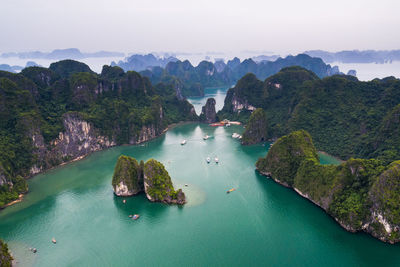 High angle view of rock formations in sea