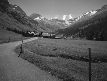 Scenic view of landscape and mountains against sky