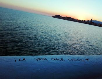 Scenic view of sea against sky at sunset