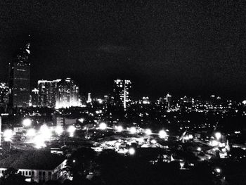 Illuminated cityscape at night