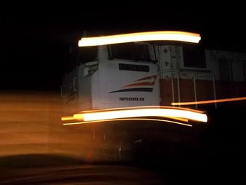 Light trails on illuminated city at night