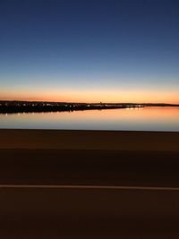 View of calm sea at sunset