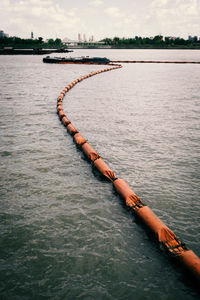 High angle view of rope on river against sky