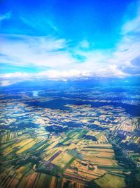 Aerial view of agricultural field against sky