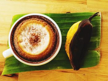 High angle view of cappuccino on table