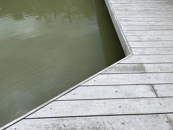 High angle view of swimming pool by lake