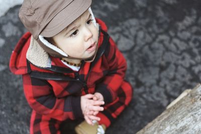 High angle view of toddler boy outdoors