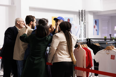 Business colleagues stacking hands