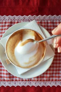 Close-up of coffee cup on table